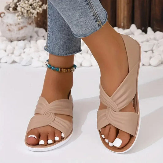 Comfortabele effenkleurige strik-platte sandalen