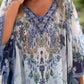 Asymmetrische damesjurk met V-hals en losse snit