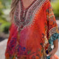 Asymmetrische damesjurk met V-hals en losse snit