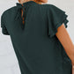Elegante, losse damestop met stippen
