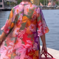 Rode jurk van chiffon met bloemenprint