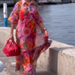 Rode jurk van chiffon met bloemenprint