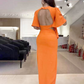 👗Rugloze midi-jurk met uitgesneden taille en split