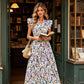 Zomer Maxi Jurk in Kleurrijke Bloemenprint | Ademend Materiaal | Perfect voor Vakantie en Feest