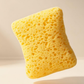 💥【50% OFF】🔥 Ultra Zachte Zeepzak Spons | Rijke Schuim, Milde Exfoliatie | Anti-slip, Zeep Blijft Zitten | Geschikt voor Gevoelige Huid & Kinderen | Schattige Kleuren | Ophangbaar & Snel Droog  | Maakt Douchen Leuk 🧼